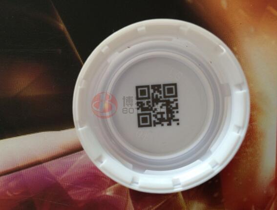 飲料瓶蓋在線激光噴碼機(jī)解決方案